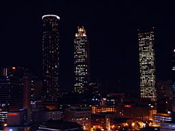 Omni Hotel at CNN Center area and Atlanta skyline at night