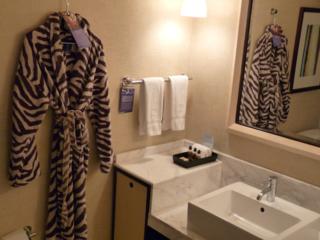 Get in touch with your animal side in your Zebra bathrobe.. 
