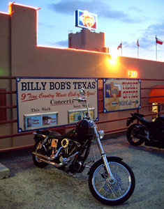 Park your horses outside and enjoy the fun at Billy Bob's Texas, the largest honky tonk in the world