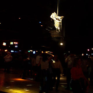 Dancing under the golden saddle at Billy Bob's Texas in Fort Worth