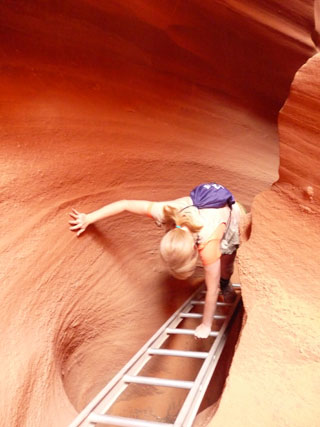 We climb by ladder into Rattlesnake Canyon