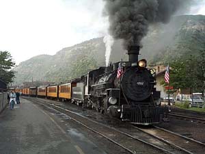 The Durango & Silverton Narrow Gauge blows off some steam and gets ready for another run