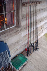 The fishing gear awaits on the porch for trying your luck