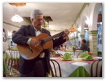 A serenading guitarist at Ma Crosby's Restaurant in nearby Cuidad Acuna