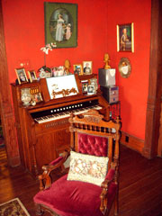 The Parlor Room is appointed with numerous antiques, paintings, and photos of the early history of the island