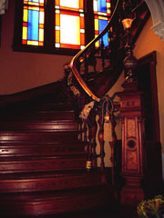 the dramatic staircase of the Coppersmith Inn