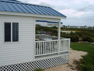 Side view of one of the waterfront lodges at the KOA